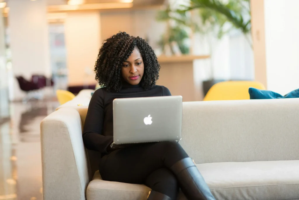 Woman working on her laptop.